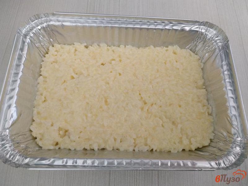 Фото приготовление рецепта: Рисовая запеканка с мясом шаг №7