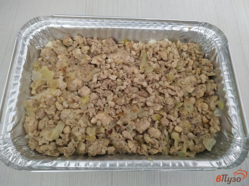Фото приготовление рецепта: Рисовая запеканка с мясом шаг №8