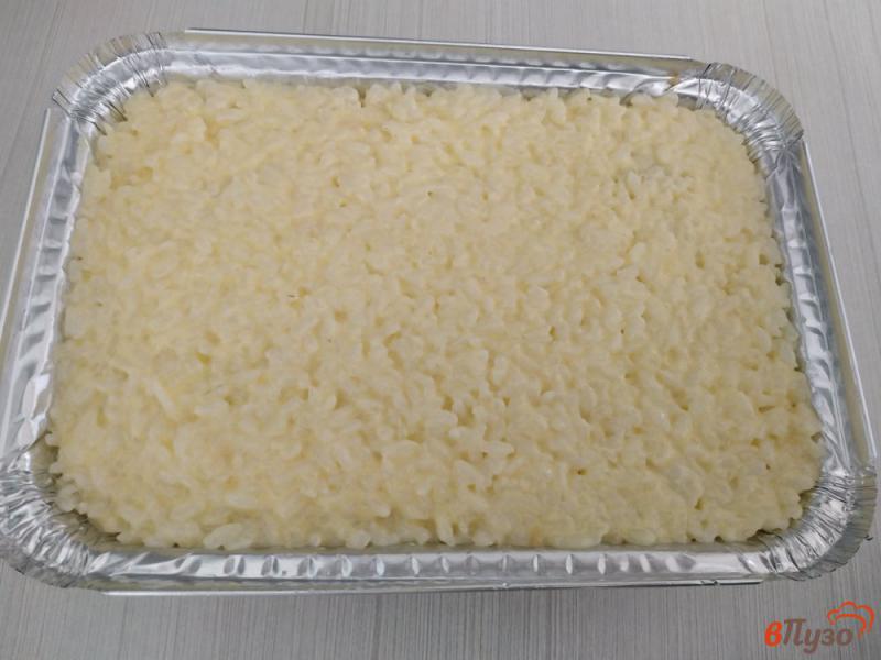 Фото приготовление рецепта: Рисовая запеканка с мясом шаг №9