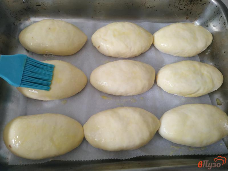 Фото приготовление рецепта: Духовые пироги с начинкой из риса и мяса шаг №15