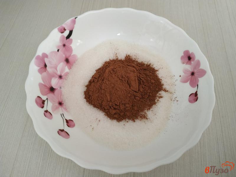 Фото приготовление рецепта: Сгущенное молоко с какао в микроволновке шаг №2