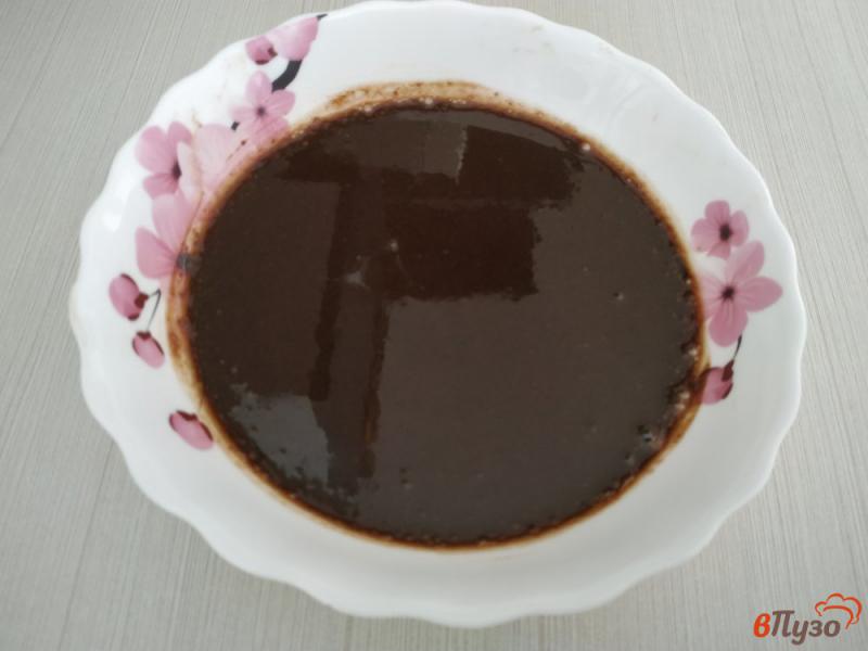 Фото приготовление рецепта: Сгущенное молоко с какао в микроволновке шаг №5