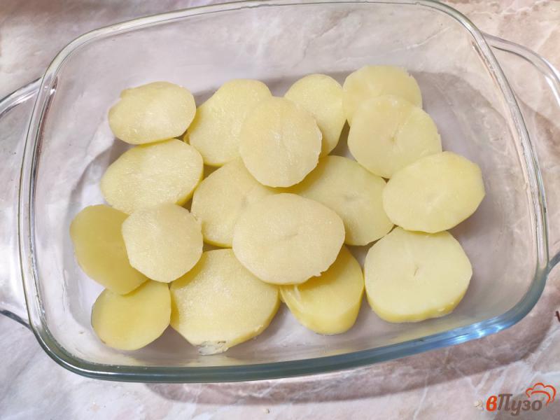 Фото приготовление рецепта: Картофельная запеканка с квашеной капустой шаг №7