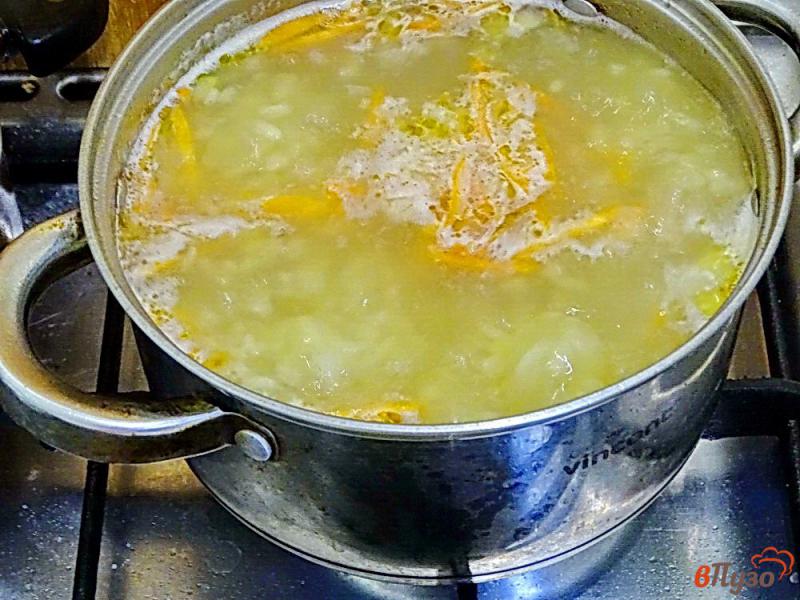 Фото приготовление рецепта: Суп с фасолью рисом и томатом шаг №7