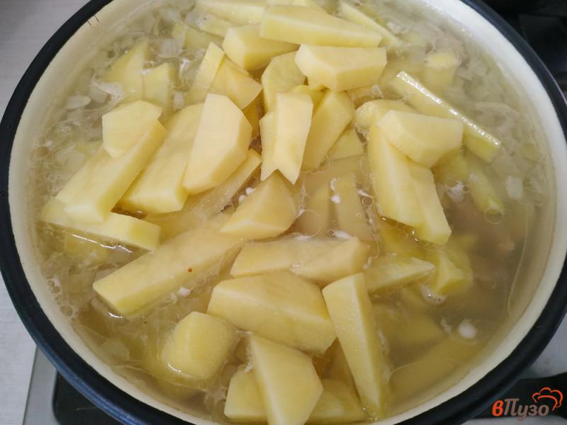 Фото приготовление рецепта: Тушеный картофель с мясом кролика шаг №6