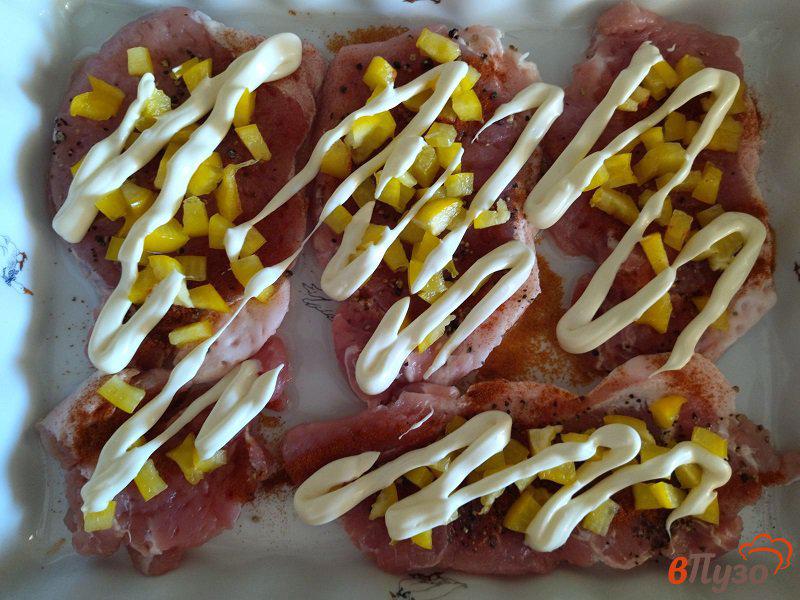 Фото приготовление рецепта: Запеченные отбивные с сыром моцарелла шаг №7