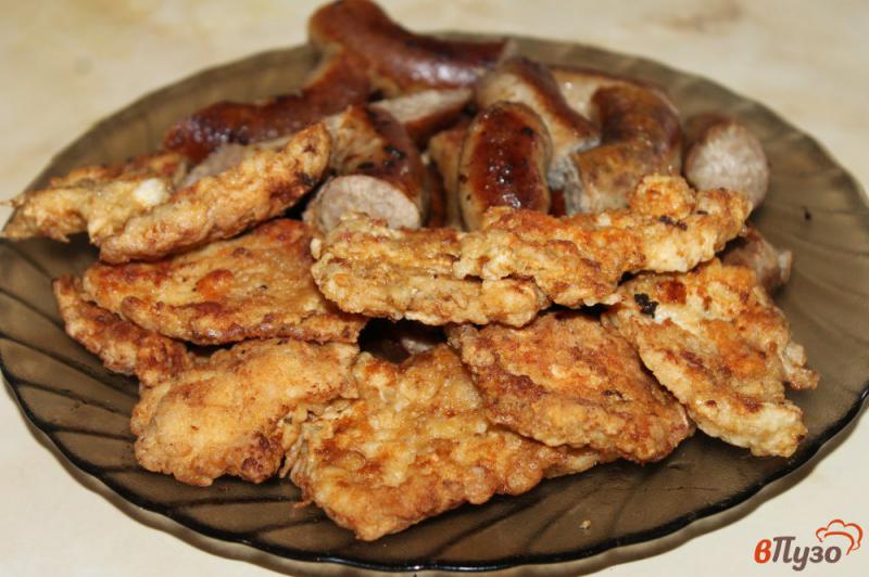 Фото приготовление рецепта: Куриные отбивные в соевом маринаде шаг №7