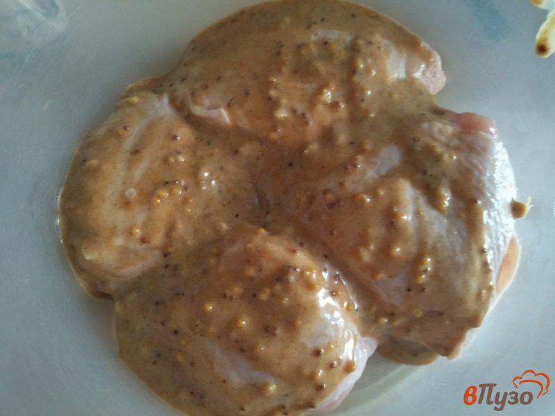 Фото приготовление рецепта: Запеченные куриные бедрышки в остро-сладком маринаде шаг №8