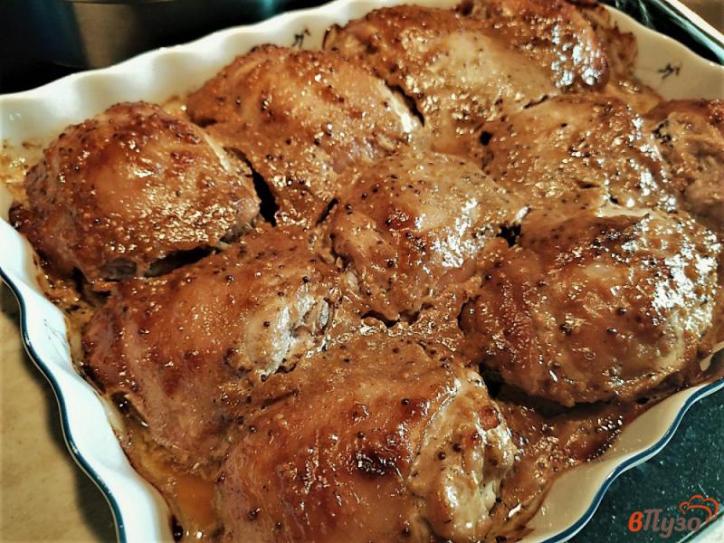 Фото приготовление рецепта: Запеченные куриные бедрышки в остро-сладком маринаде шаг №9