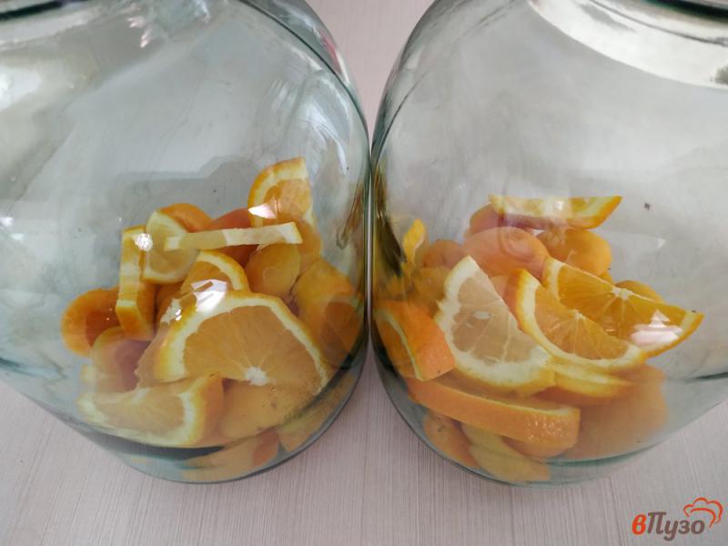 Фото приготовление рецепта: Абрикосовый компот с апельсином и лимоном шаг №3