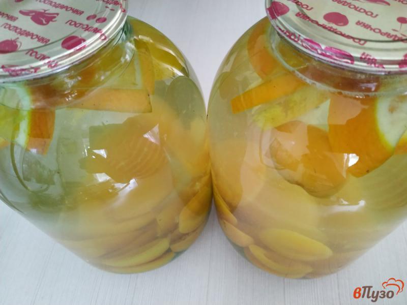 Фото приготовление рецепта: Абрикосовый компот с апельсином и лимоном шаг №7