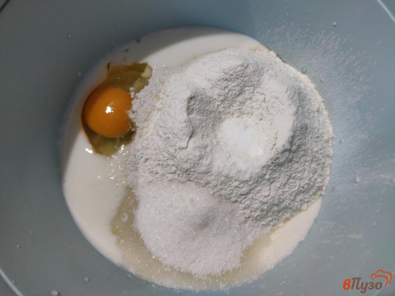 Фото приготовление рецепта: Оладьи с консервированными абрикосами шаг №2