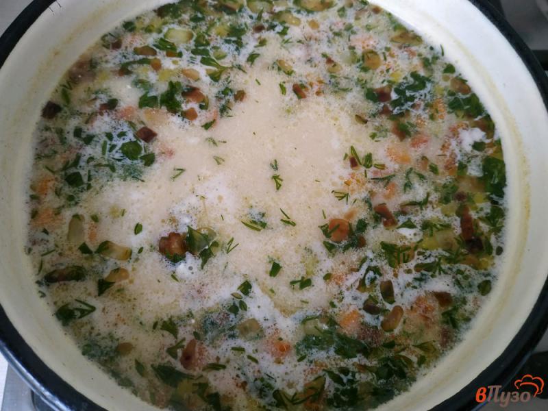 Фото приготовление рецепта: Сырный суп с зелёным горошком шаг №8