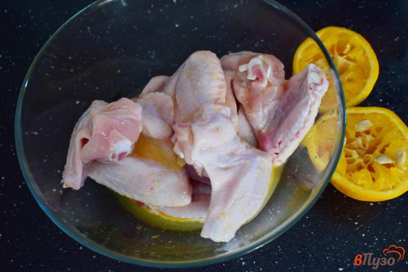 Фото приготовление рецепта: Куриные крылышки в апельсиновом маринаде шаг №2