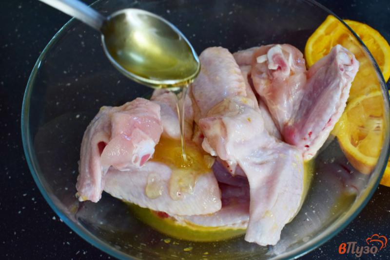 Фото приготовление рецепта: Куриные крылышки в апельсиновом маринаде шаг №3
