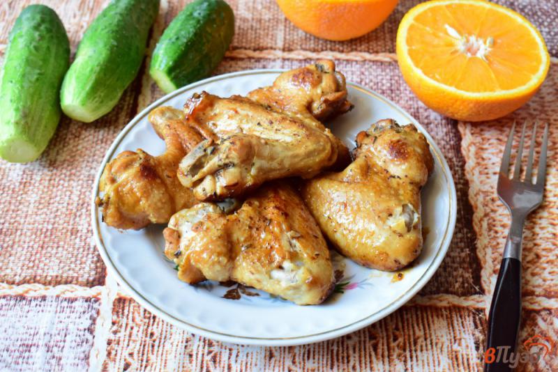 Фото приготовление рецепта: Куриные крылышки в апельсиновом маринаде шаг №7