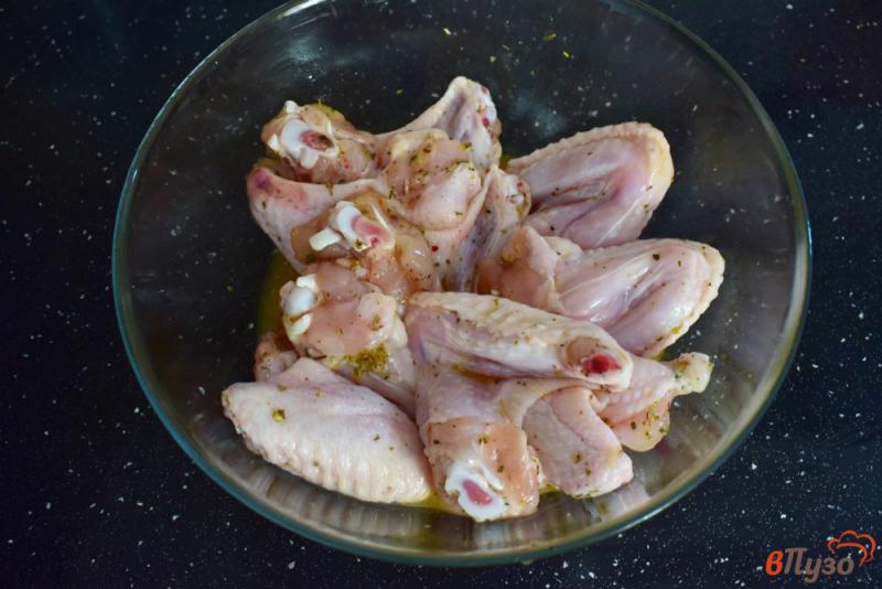 Фото приготовление рецепта: Куриные крылышки в апельсиновом маринаде шаг №4