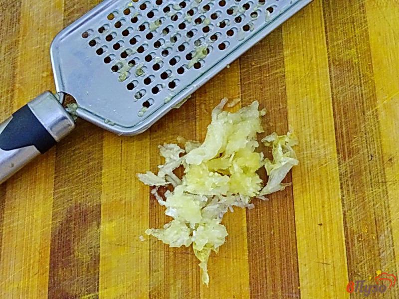 Фото приготовление рецепта: Кабачки пряные под сметаной в духовке шаг №6