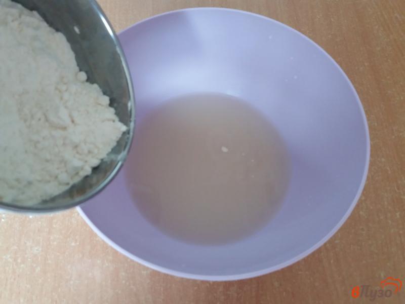 Фото приготовление рецепта: Жареные дрожжевые пирожки с рисом и грибами шаг №2