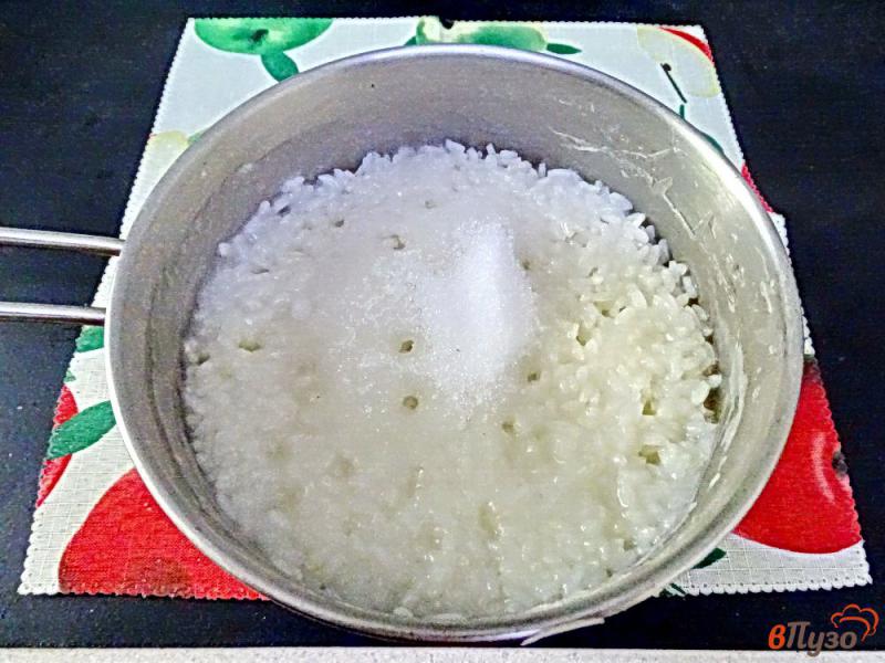 Фото приготовление рецепта: Рисовая каша молочная шаг №4