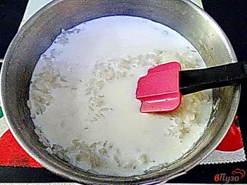 Фото приготовление рецепта: Рисовая каша молочная шаг №5