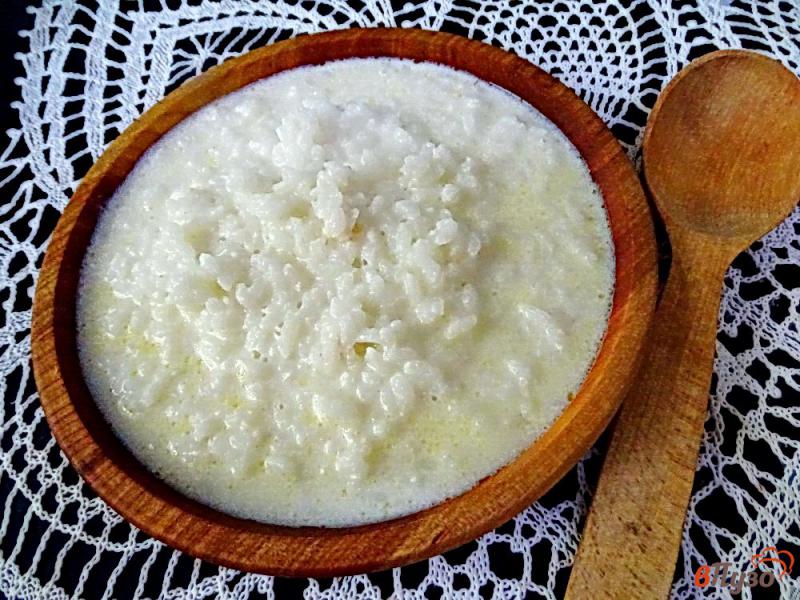 Фото приготовление рецепта: Рисовая каша молочная шаг №7