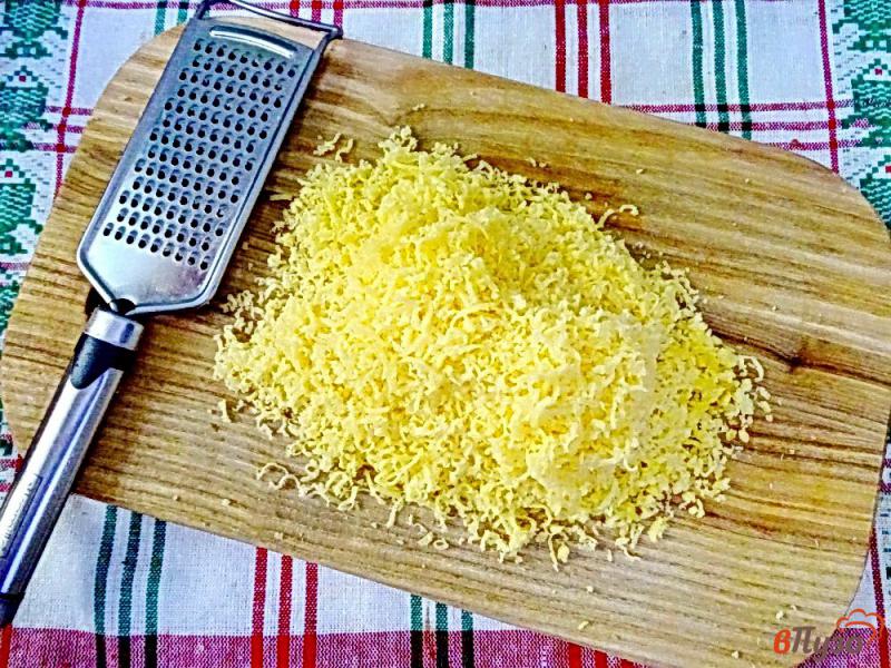 Фото приготовление рецепта: Баклажаны в соусе под сырной крышечкой шаг №7