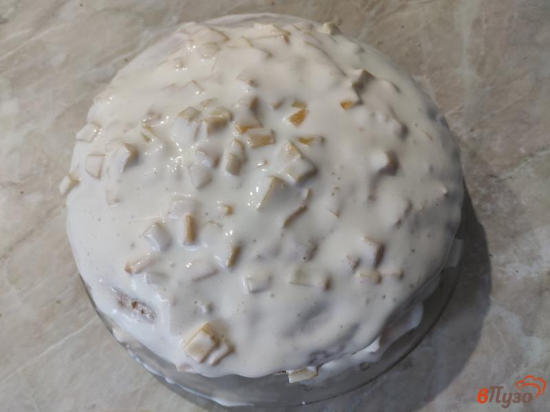Фото приготовление рецепта: Бисквитный торт с персиками шаг №11