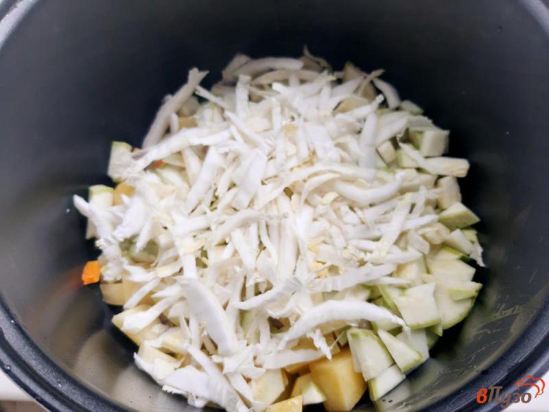 Фото приготовление рецепта: Рагу овощное с кабачками и капустой шаг №8