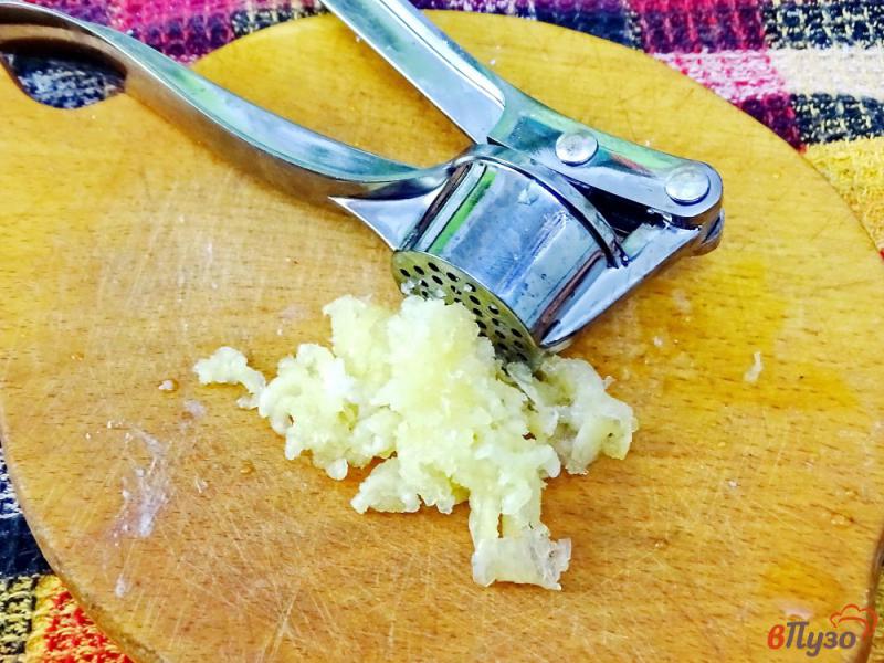 Фото приготовление рецепта: Шпинат со сметаной сыром и чесноком шаг №7