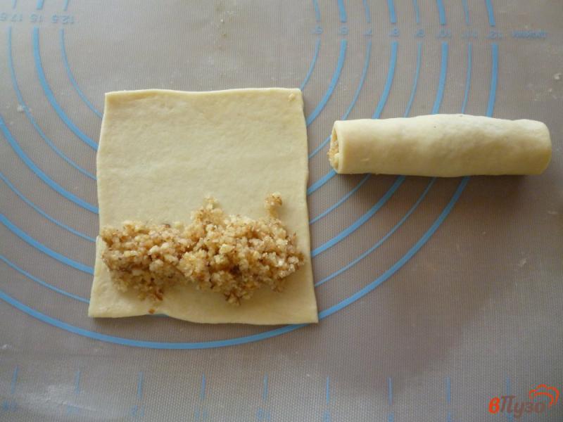 Фото приготовление рецепта: Трубочки с ореховой начинкой шаг №8