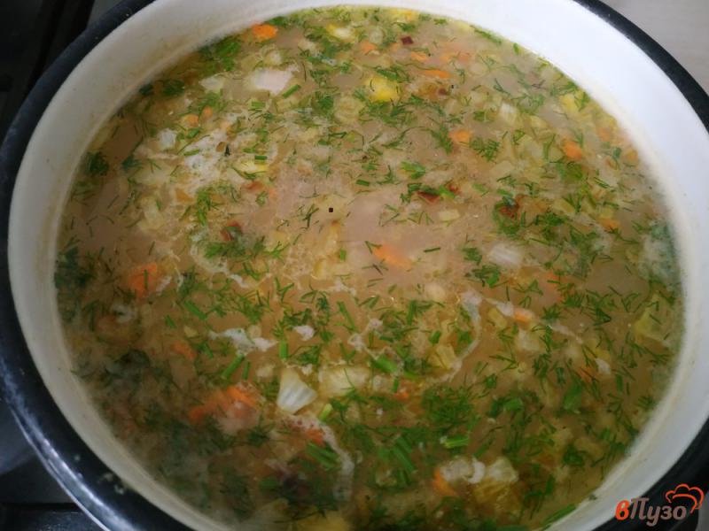 Фото приготовление рецепта: Куриный суп с овсяными хлопьями и кукурузой шаг №7