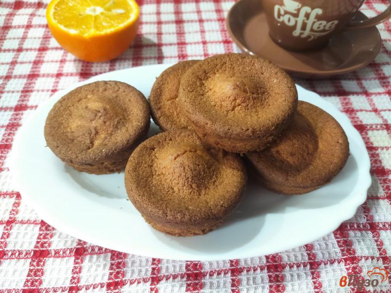 Фото приготовление рецепта: Апельсиновые кексы шаг №9