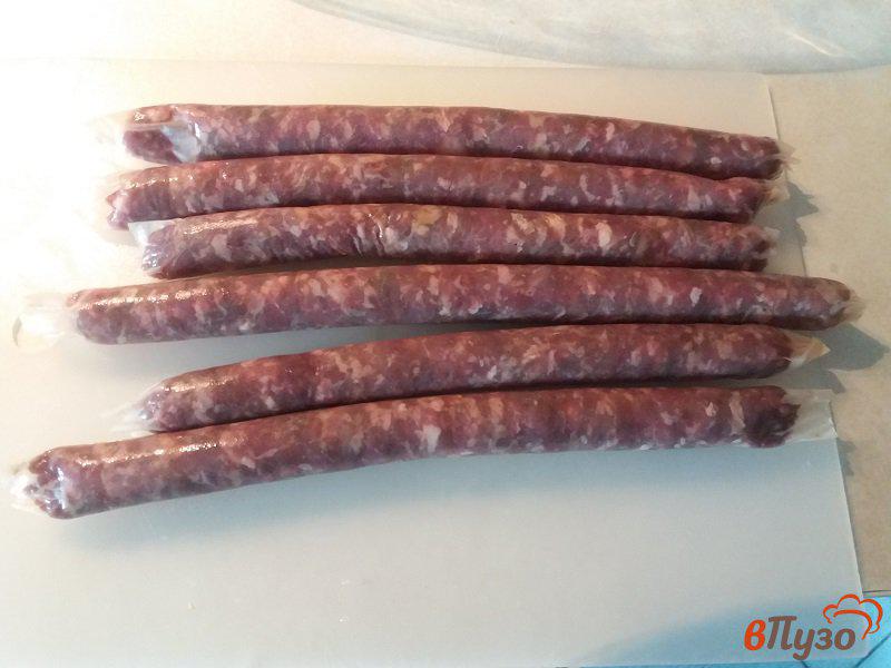 Фото приготовление рецепта: Запеченный картофель с колбасками  из баранины в мультиварке шаг №5