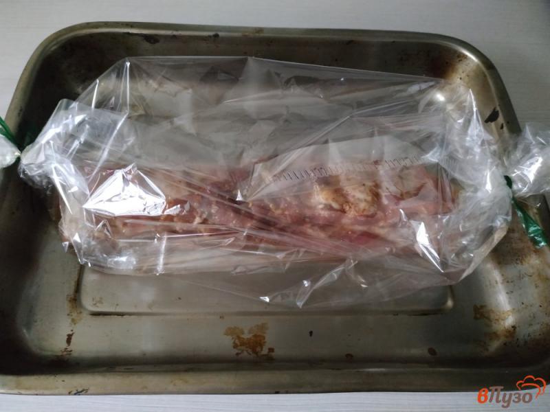 Фото приготовление рецепта: Свиные ребрышки запеченые в медово-лимоном маринаде шаг №6