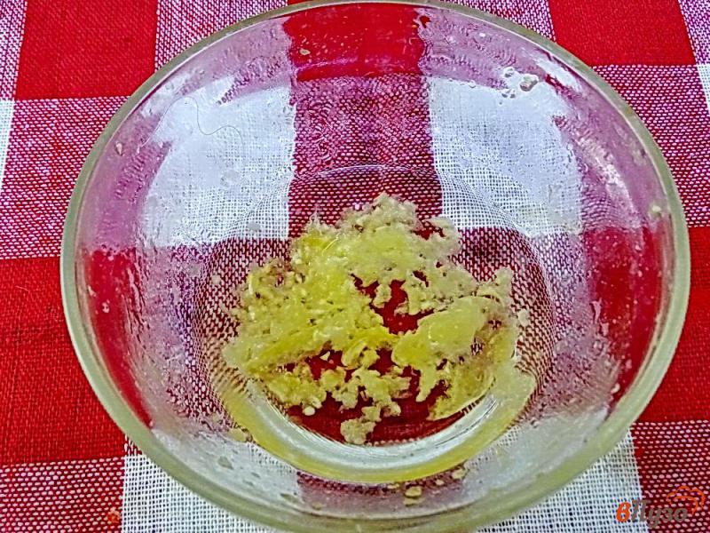 Фото приготовление рецепта: Тыква запеченная с чесноком и лимонным соком шаг №3