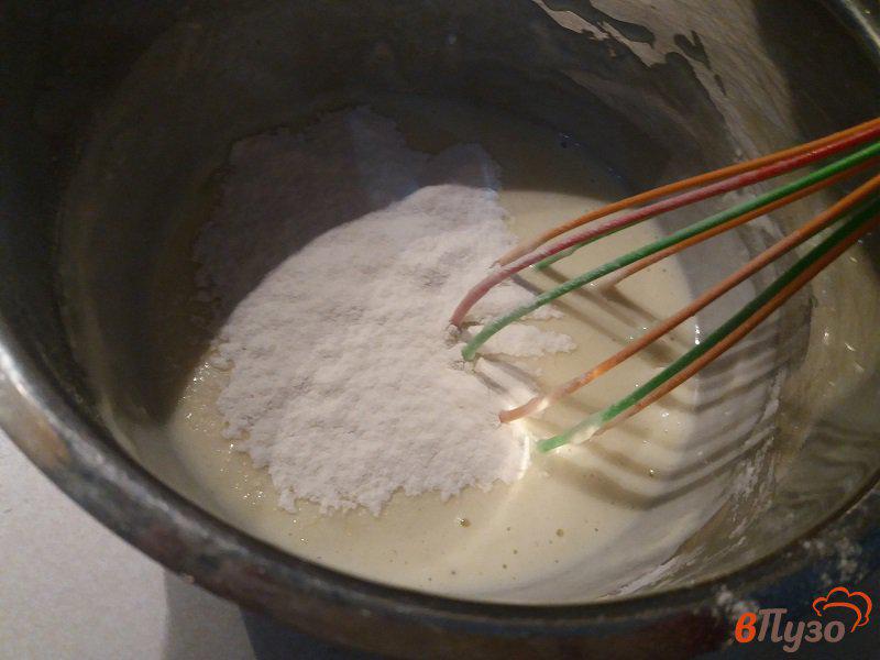 Фото приготовление рецепта: Воздушные оладьи с шоколадом шаг №4