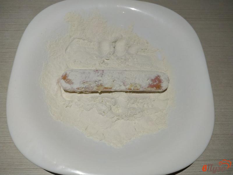 Фото приготовление рецепта: Сосиски в кляре на сковороде шаг №5