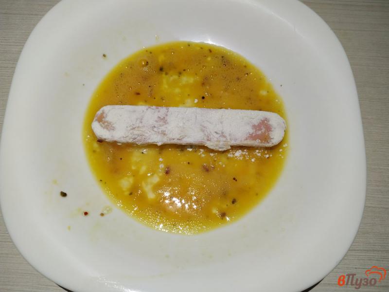 Фото приготовление рецепта: Сосиски в кляре на сковороде шаг №6