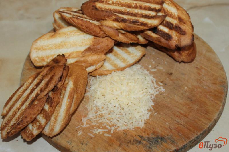 Фото приготовление рецепта: Бутерброды с сыром и оливками шаг №4