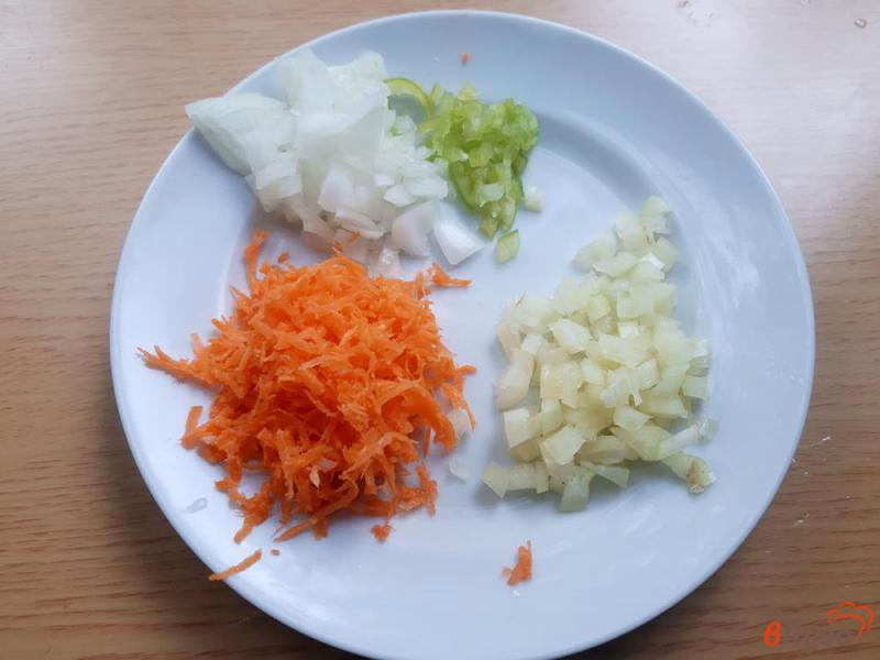 Фото приготовление рецепта: Суп  с рисом и фрикадельками шаг №9