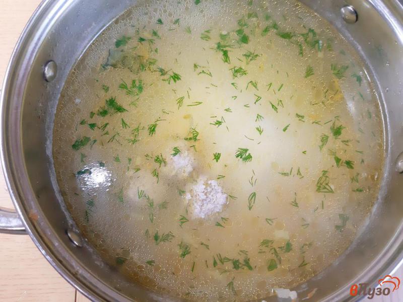 Фото приготовление рецепта: Суп  с рисом и фрикадельками шаг №12