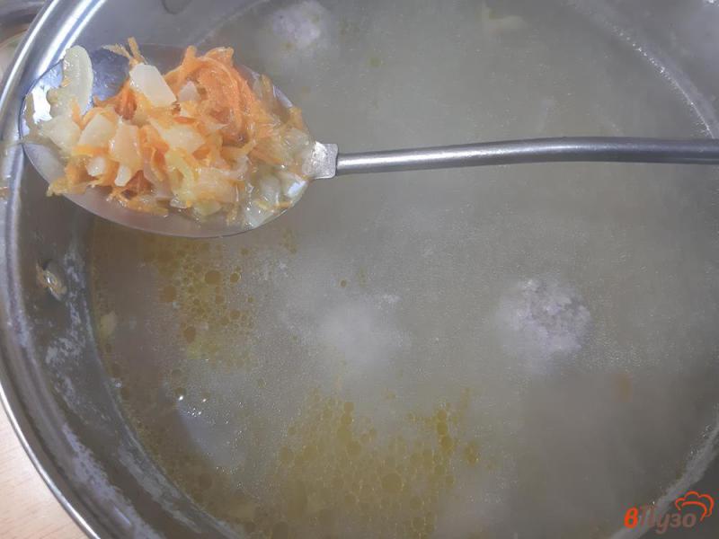 Фото приготовление рецепта: Суп  с рисом и фрикадельками шаг №11
