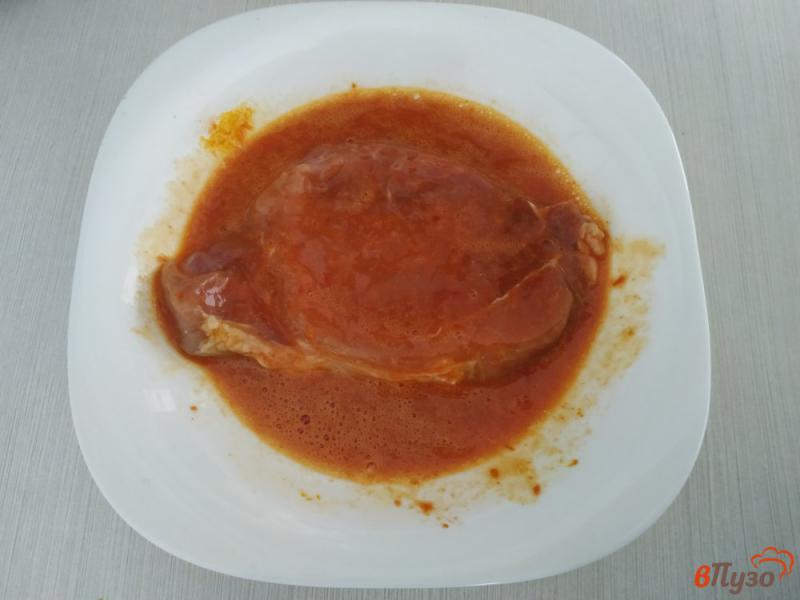 Фото приготовление рецепта: Отбивные из свинины в томатном кляре шаг №4