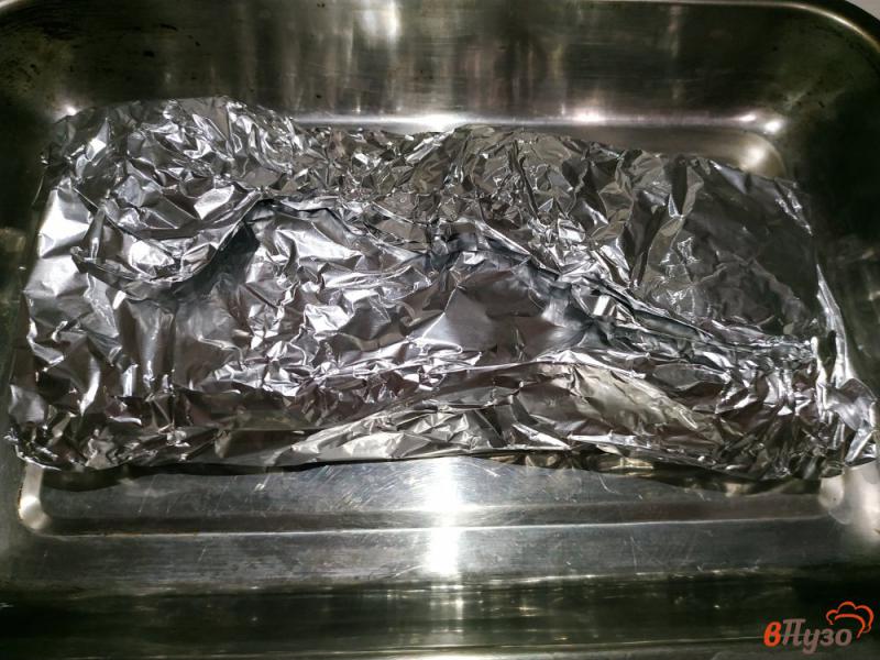 Фото приготовление рецепта: Запеченный толстолобик в духовке шаг №4
