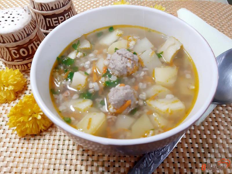 Фото приготовление рецепта: Суп с фрикадельками и гречкой шаг №9