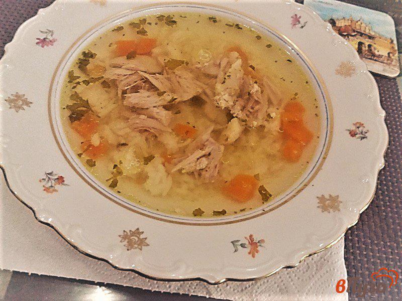Фото приготовление рецепта: Суп  куриный с рисом шаг №6