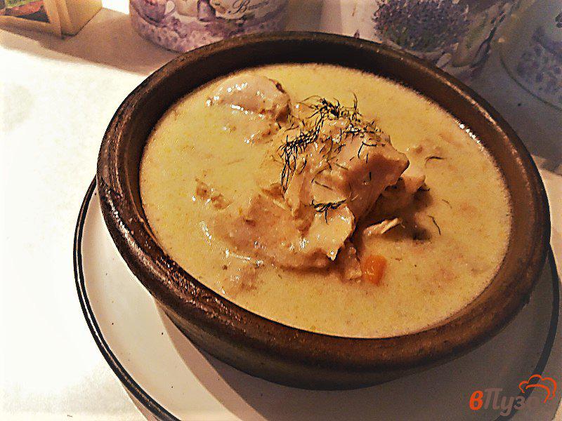 Фото приготовление рецепта: Тушеное мясо кролика в сметанном соусе шаг №14