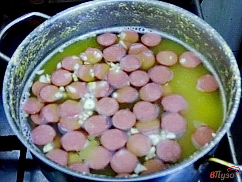 Фото приготовление рецепта: Гороховый суп с сосисками шаг №9