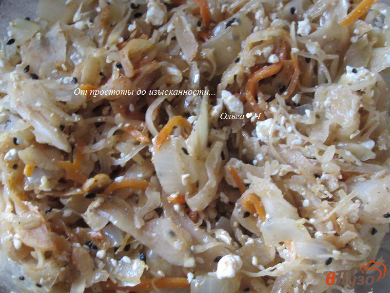 Фото приготовление рецепта: Цельнозерновые улитки с квашеной капустой и творогом шаг №4